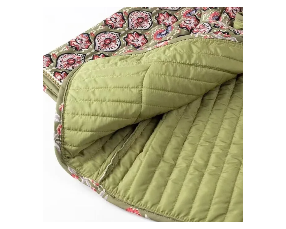 Sage green quilted jacket lining detail