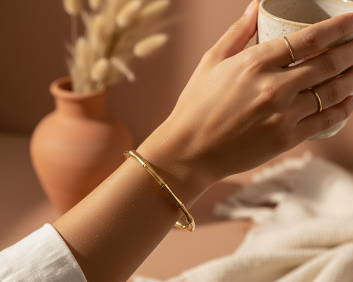 Aurora Bamboo Gold Cuff Bangle – Model Wrist Shot