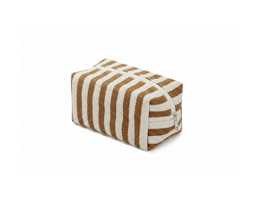 Striped canvas zip pouch in tan and cream on pure white background