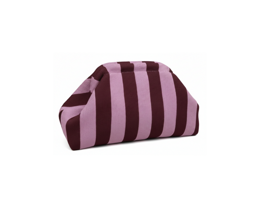 Striped knit clutch bag in pink and burgundy on pure white background