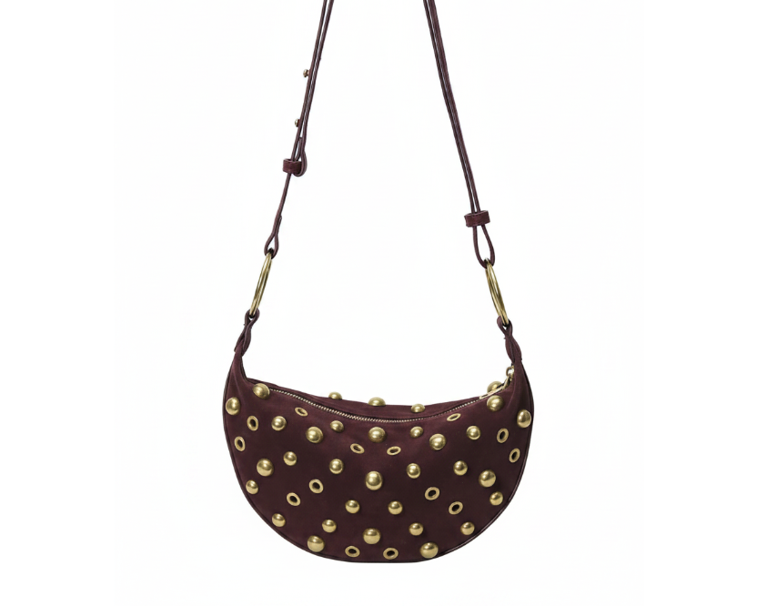 Studded crescent shoulder bag in wine red with gold studs on pure white background