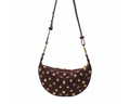 Studded crescent shoulder bag in wine red with gold studs on pure white background