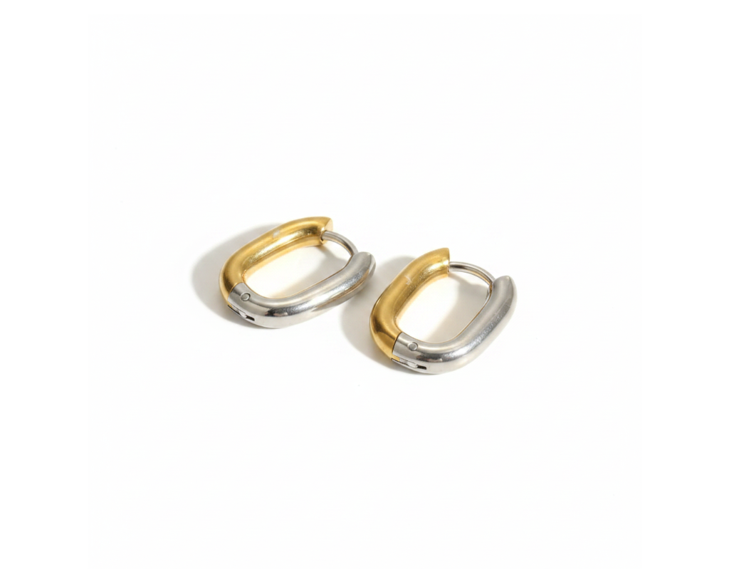 Gold Silver Oval Hoop Earrings on pure white background