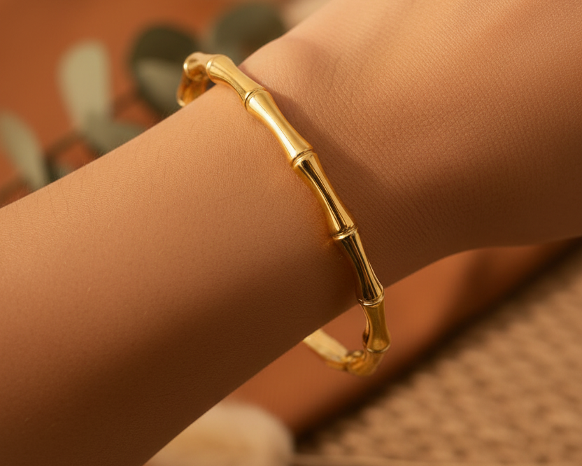 Model wearing Aurora Bamboo Gold Cuff Bangle
